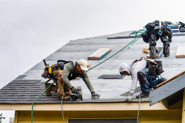 Professional Gutter Installation technician working in Hopkinton, MA
